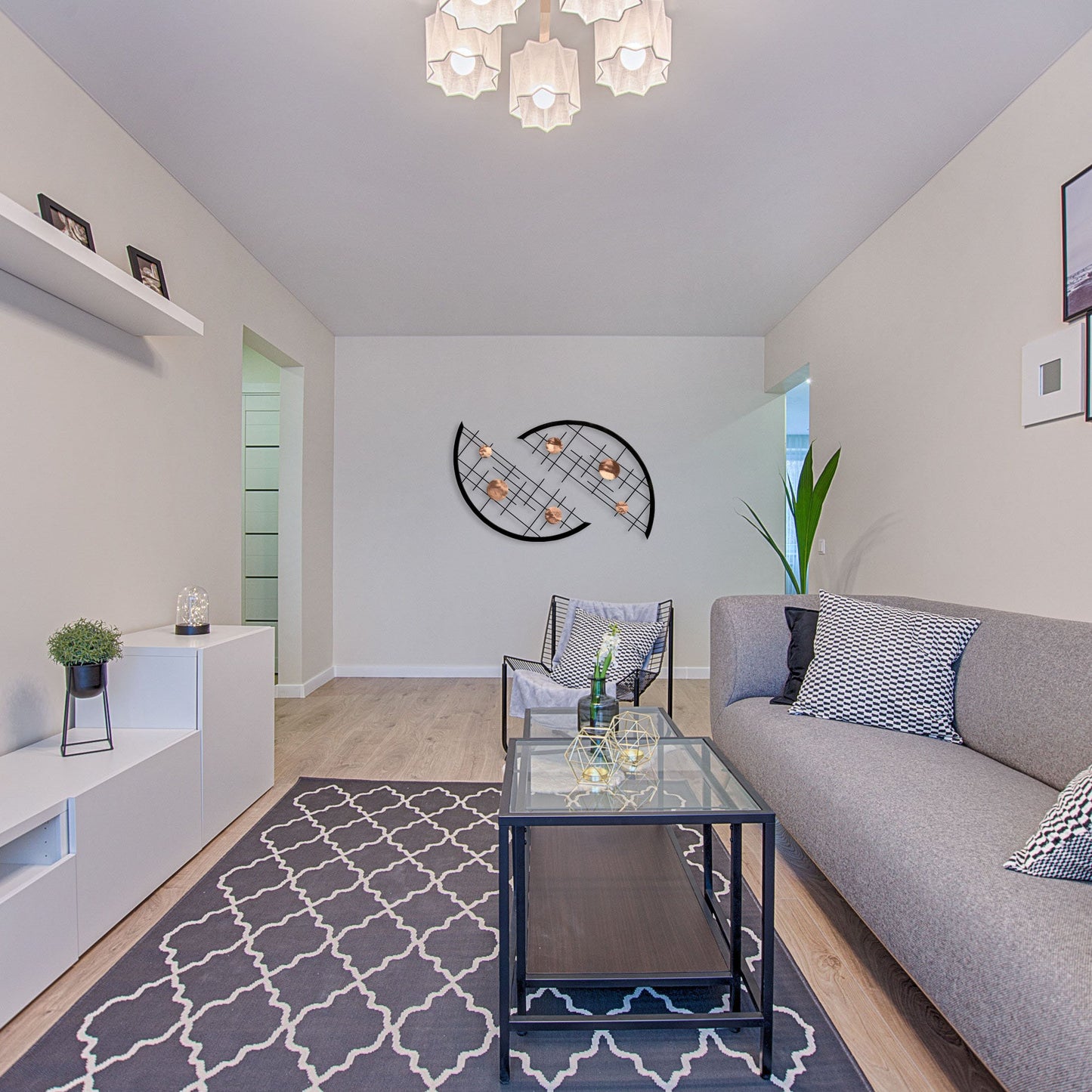bright copper looks like a new penny and mixes beautifully with the other metallics in this long narrow living room decorating challenge
