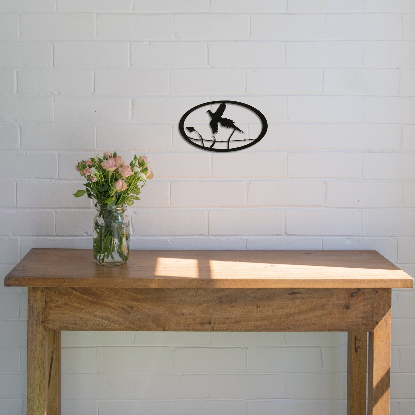 black-pheasant-oval-over-table-scaled-1