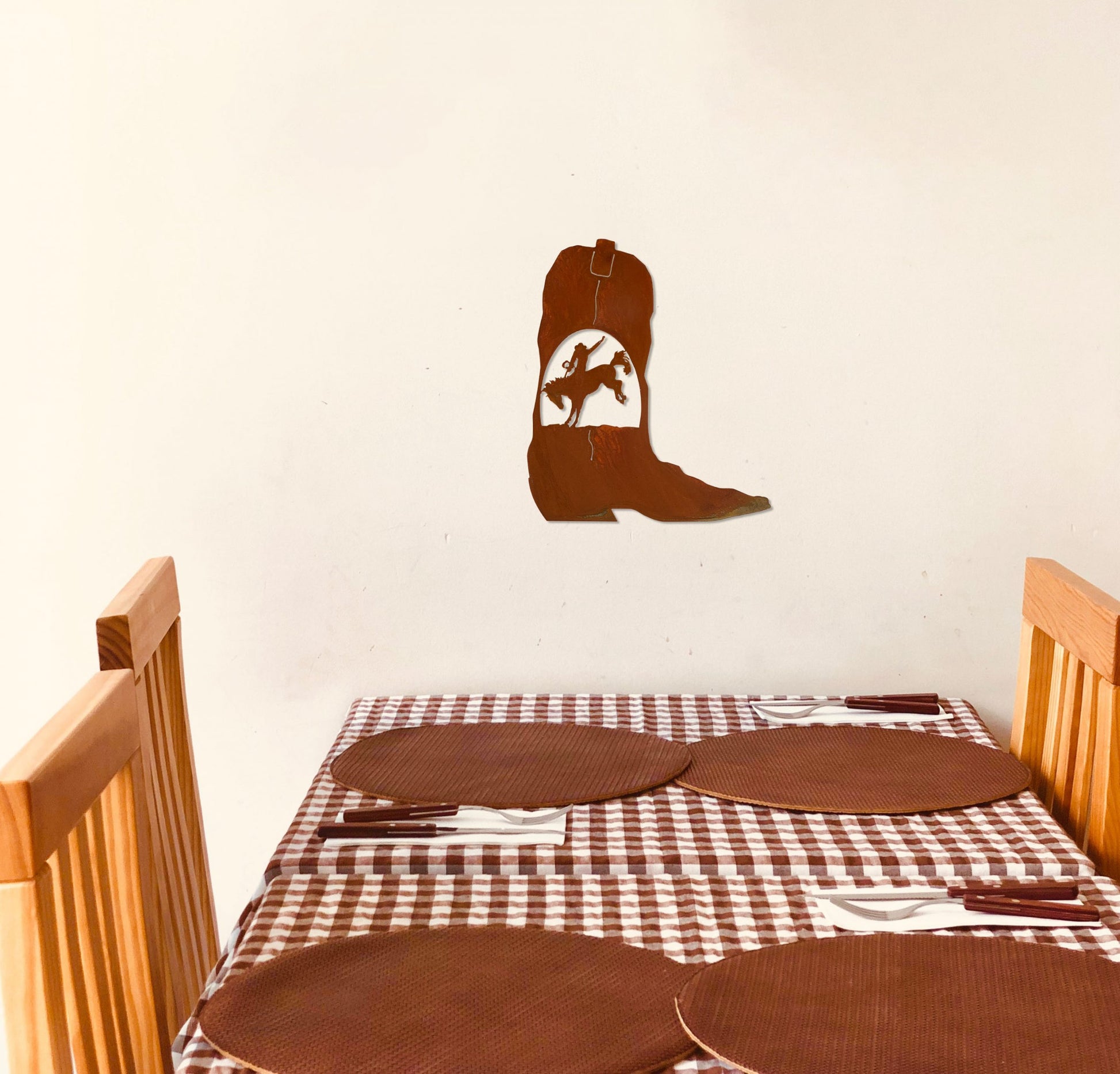 bronco-rider-boot-rust-over-table-scaled-1