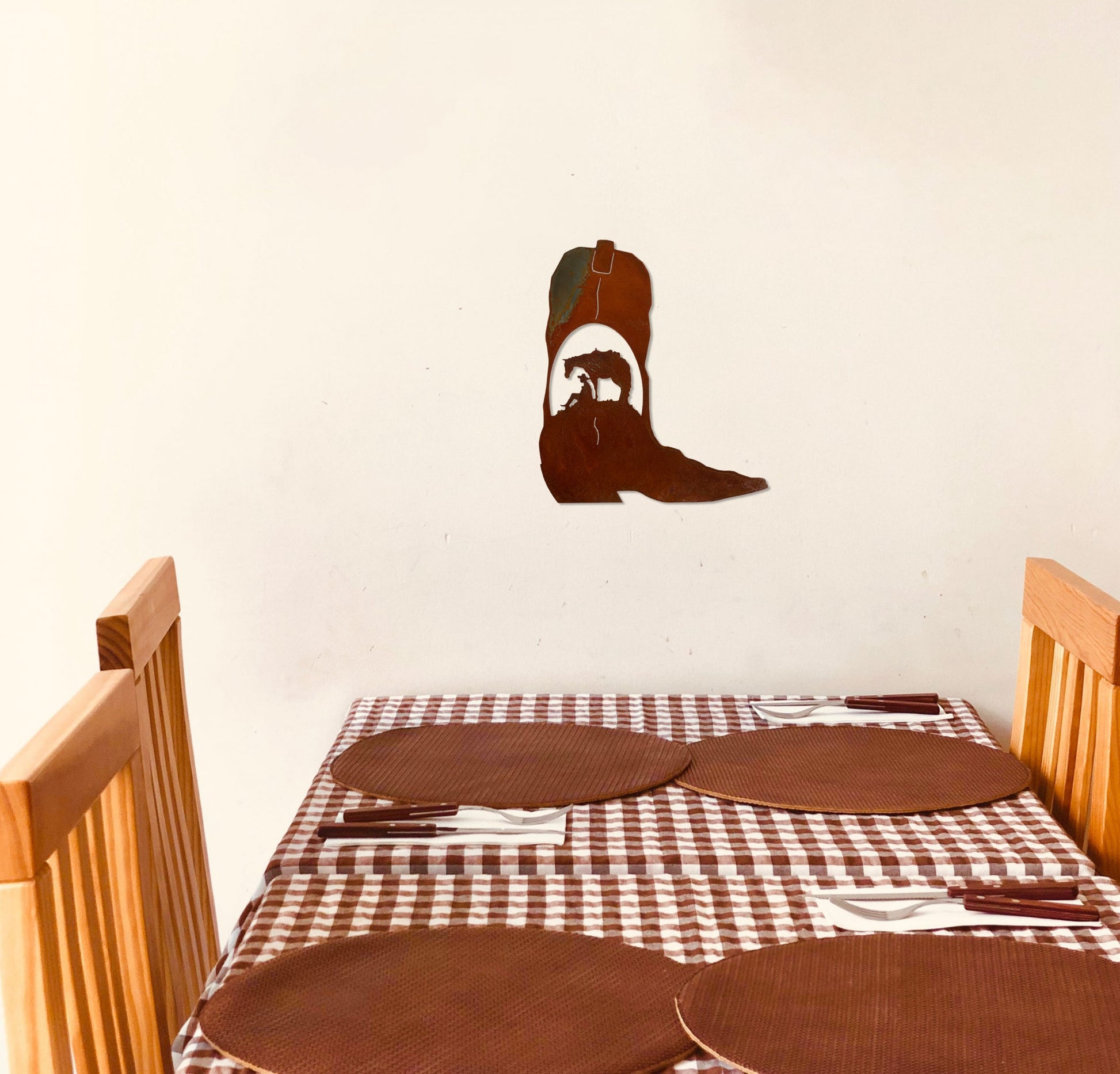 cowboy-and-horse-boot-rust-over-table-scaled-1