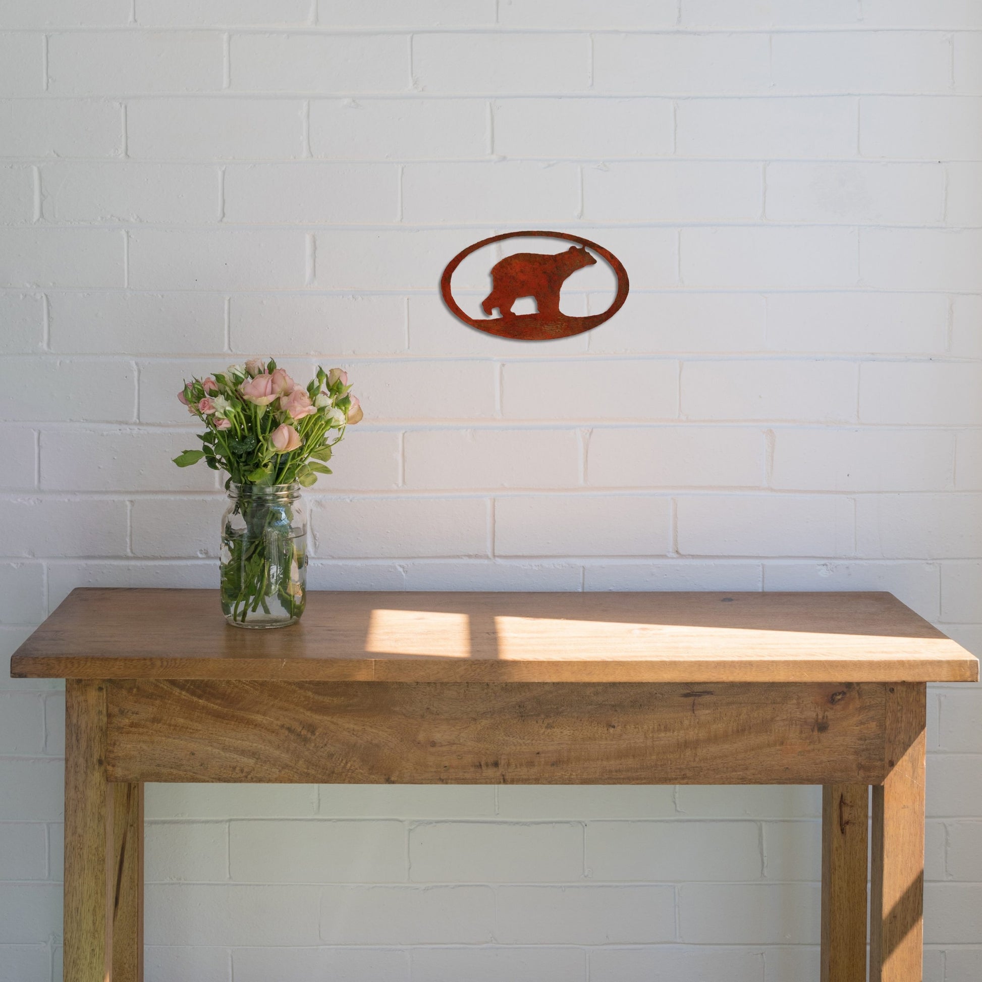 rust-bear-oval-over-table-scaled
