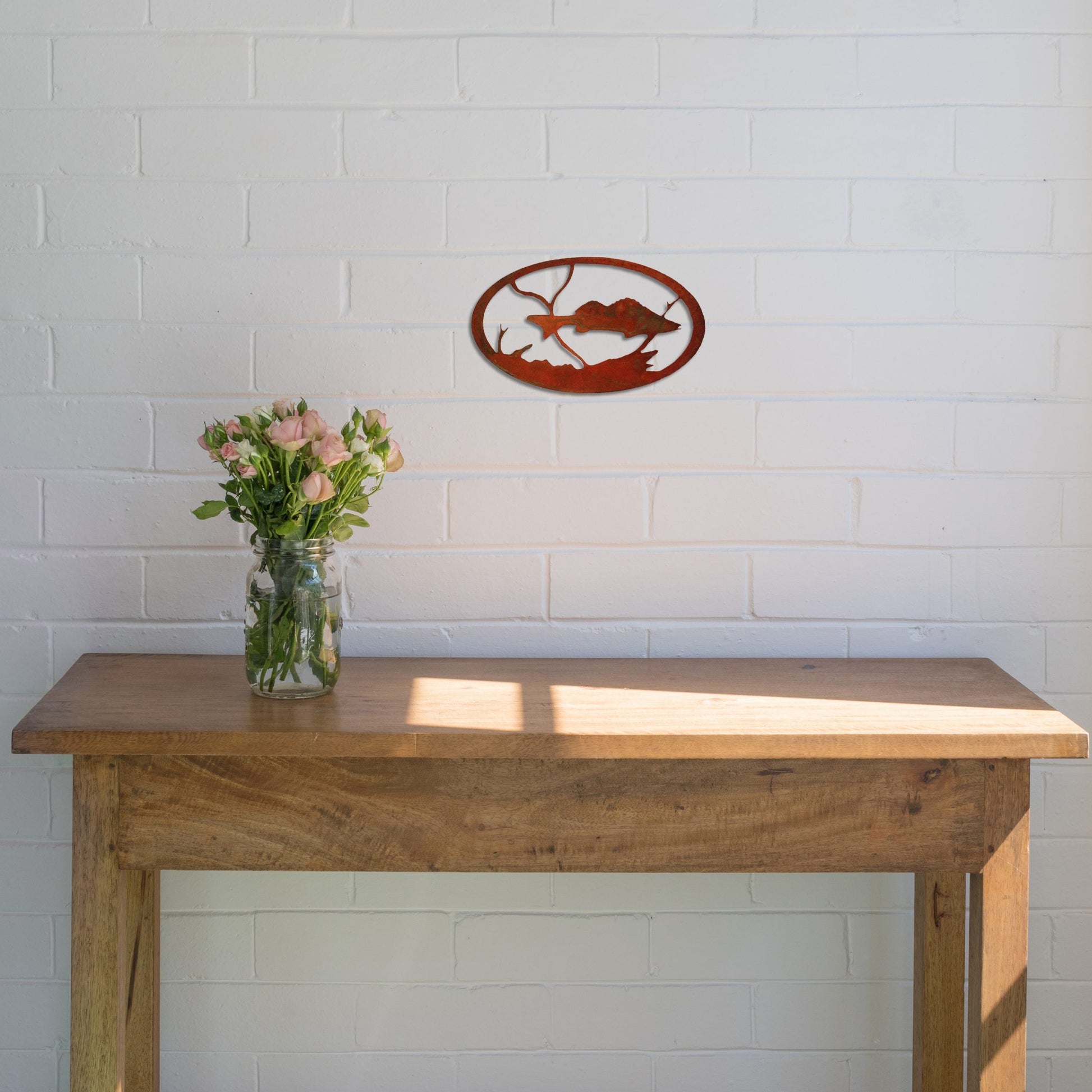 rust-fish-oval-over-table-scaled-1